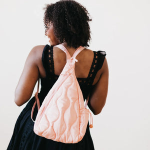 STRIDING THROUGH PHILLY PUFFER SLING BAG & BACKPACK